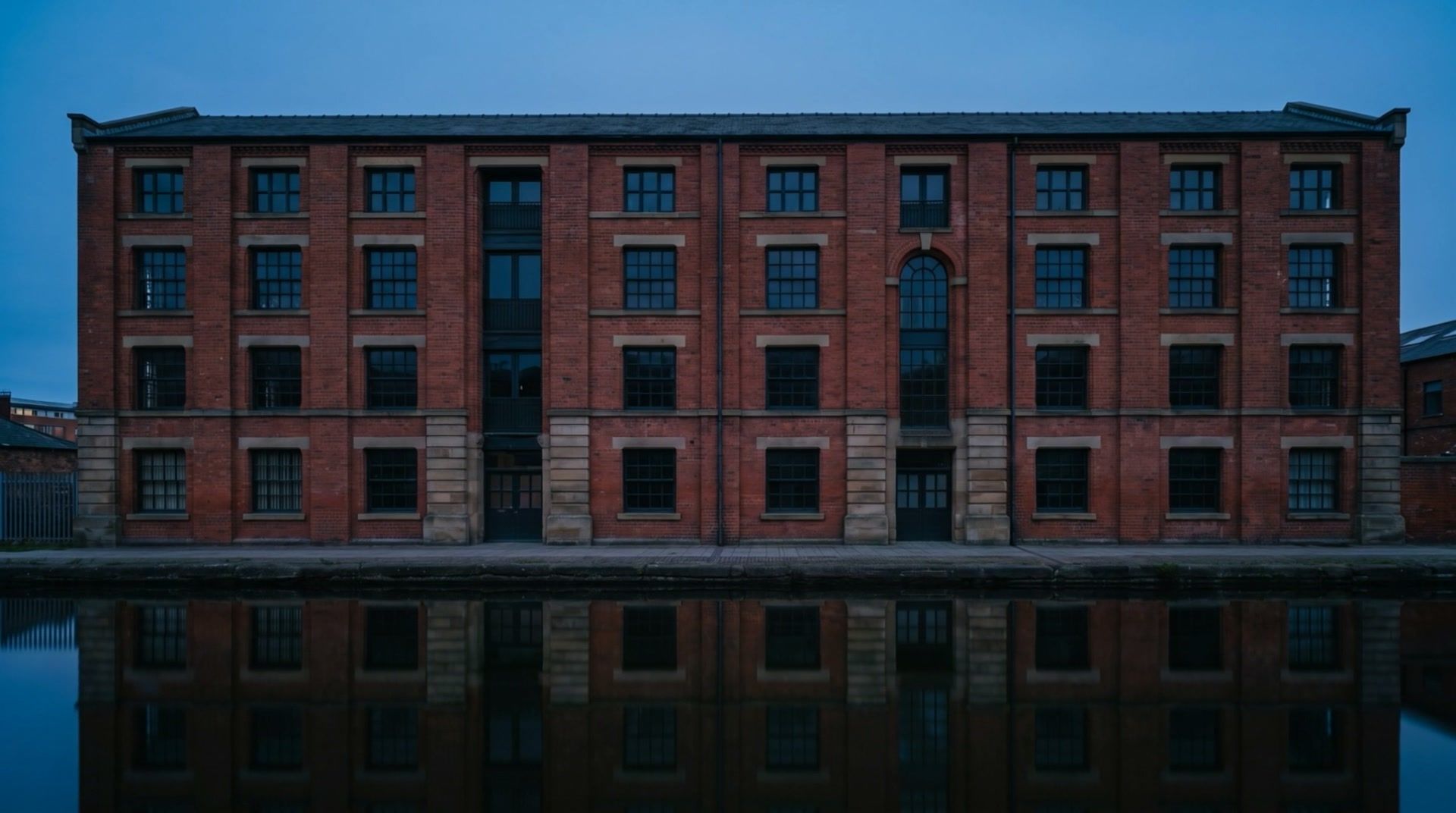 North Quay Works at night, every window dark.
